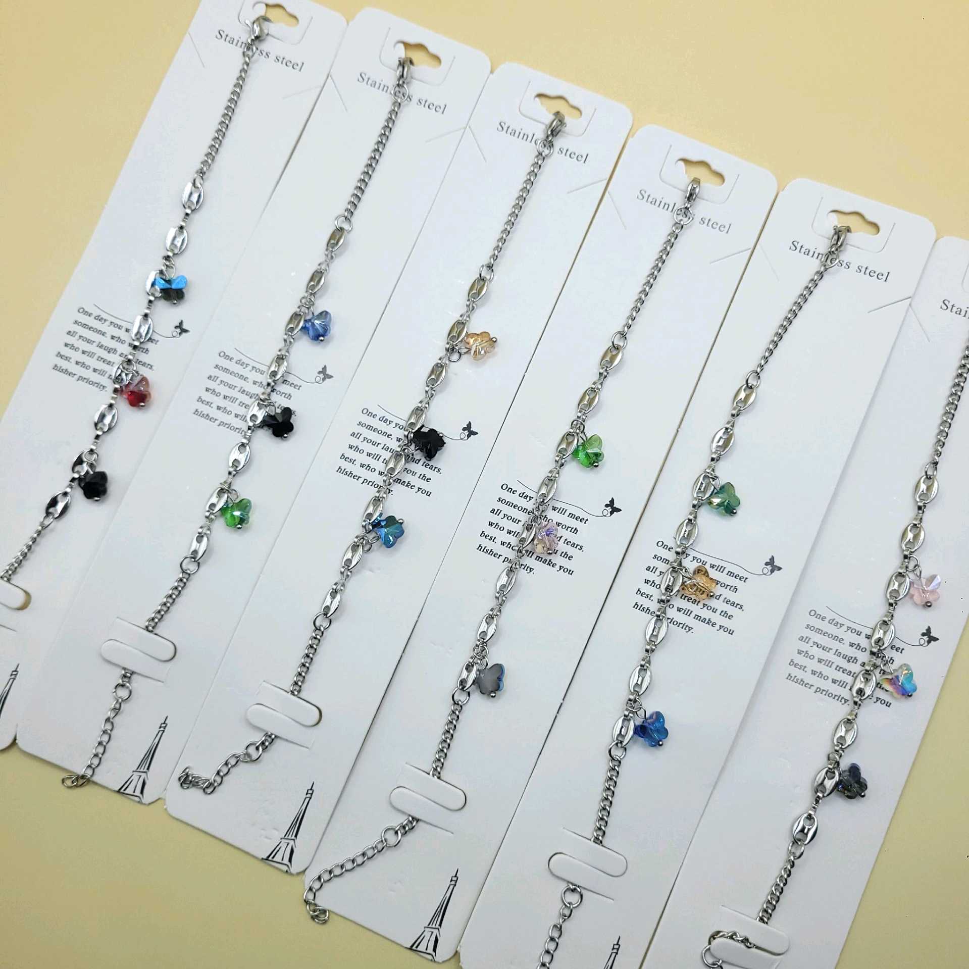 Pulsera tono plata dijes mariposas / acero inoxidable  (se envía modelo al azar ) 