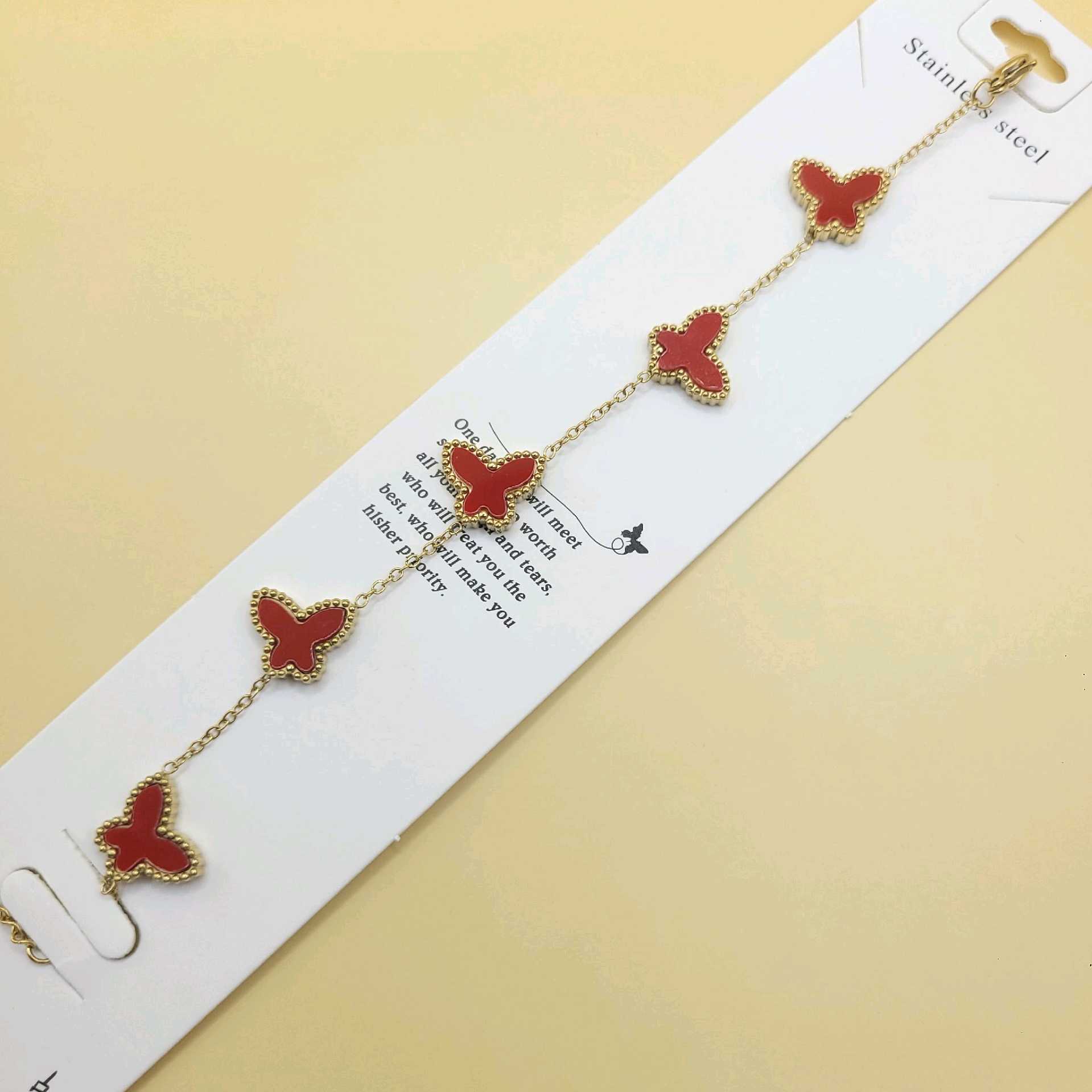 Pulsera mariposas rojas / acero inoxidable 
