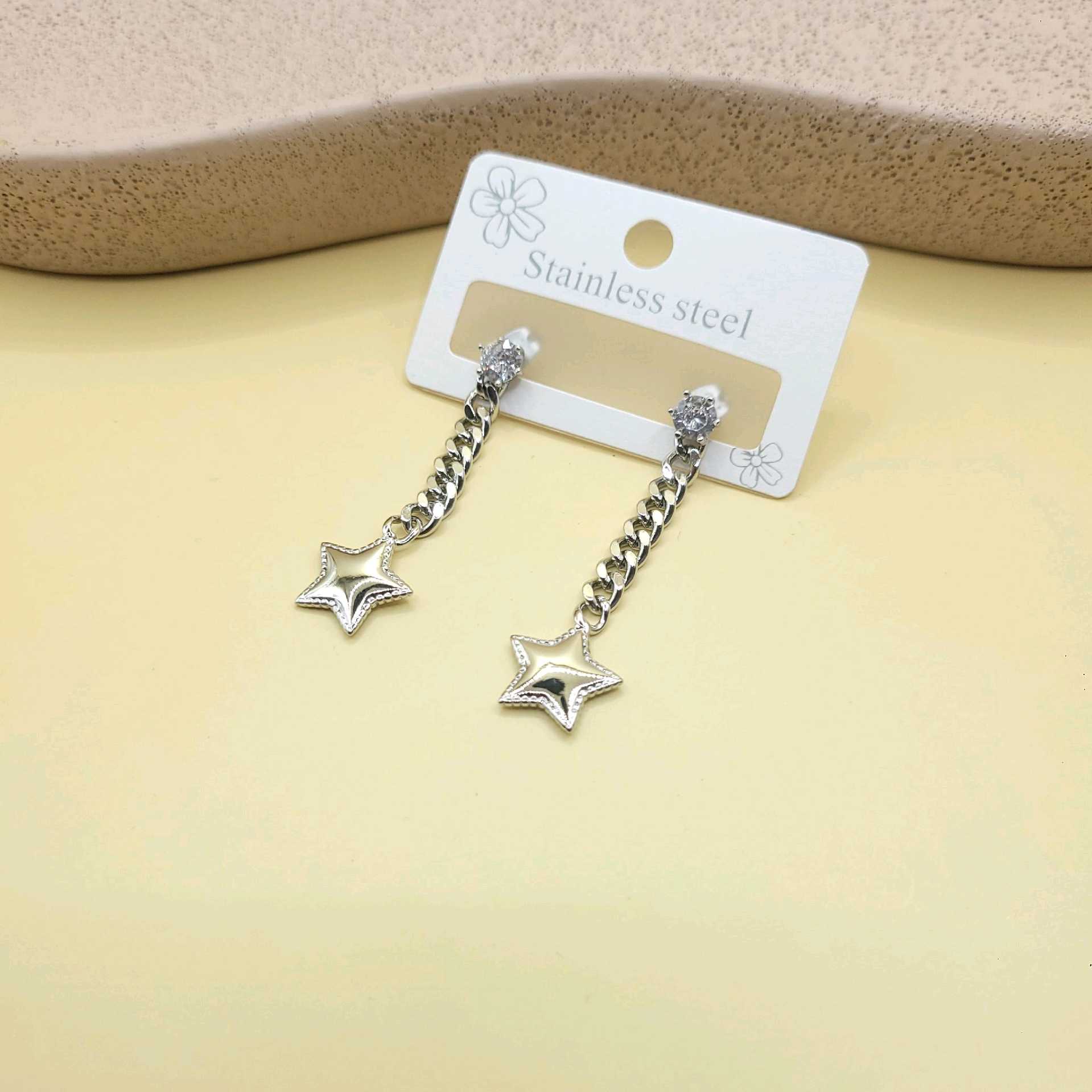 Aretes largos estrella 4cm largo/ acero inoxidable 