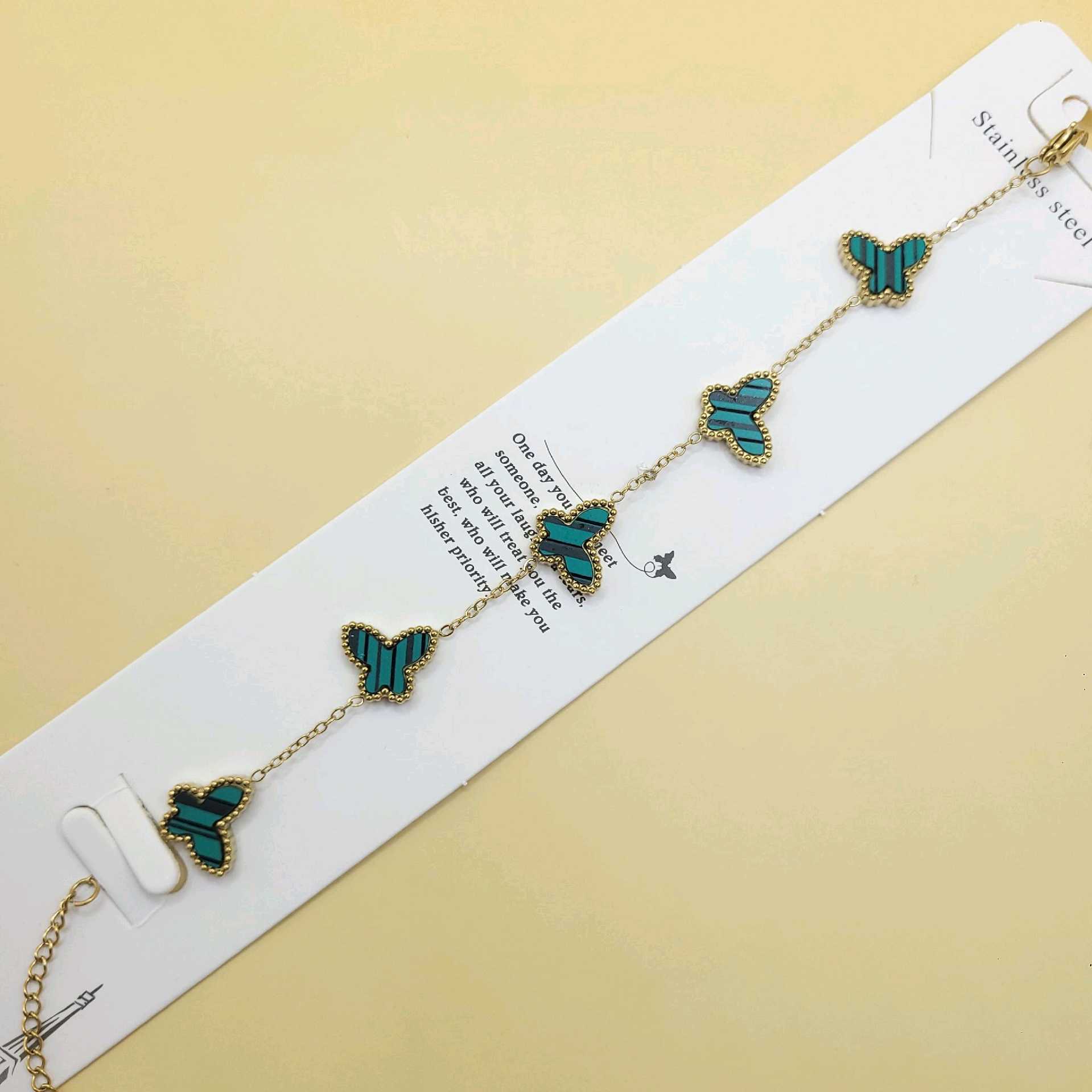 Pulsera mariposas verdes / acero inoxidable 