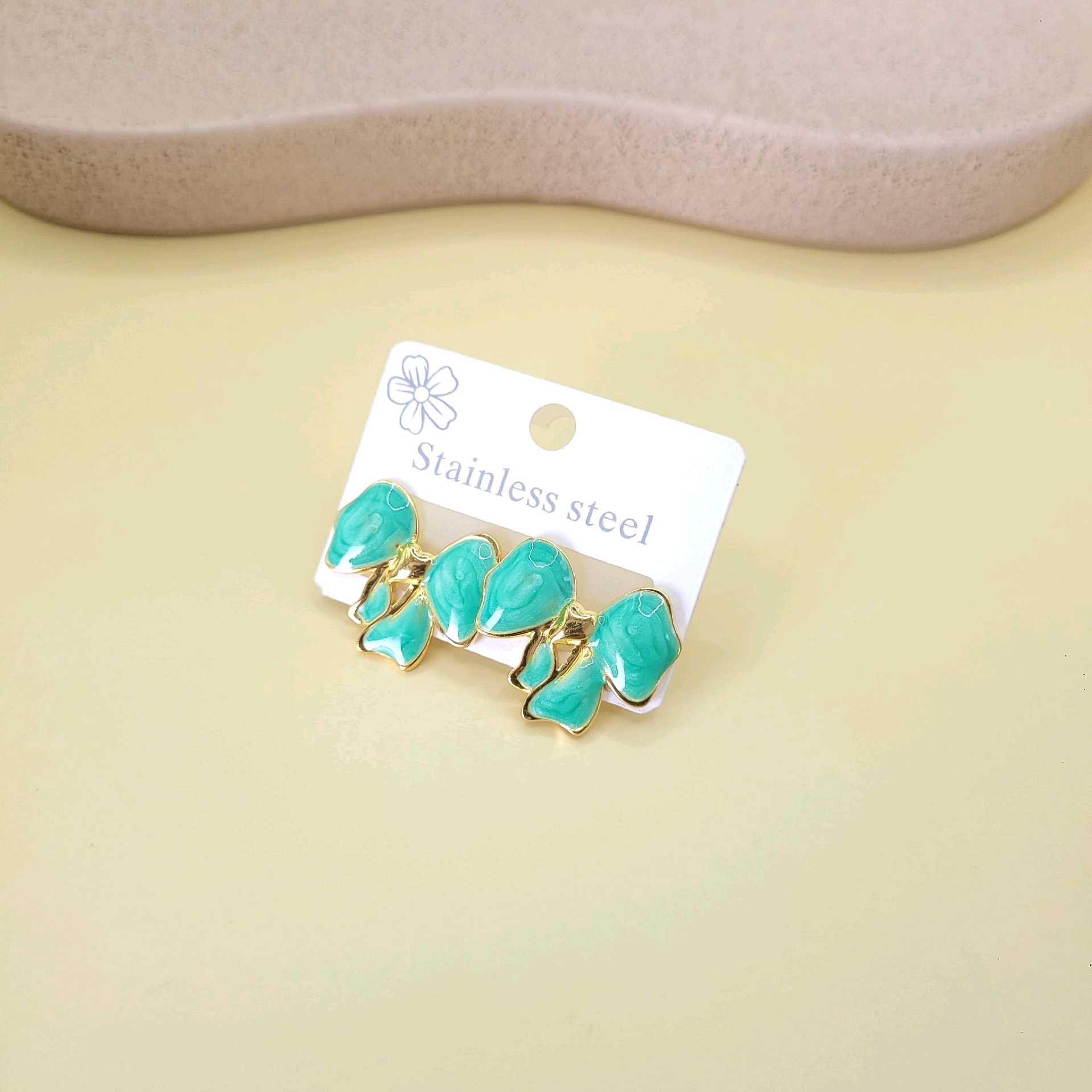 Aretes moño turquesa / acero inoxidable