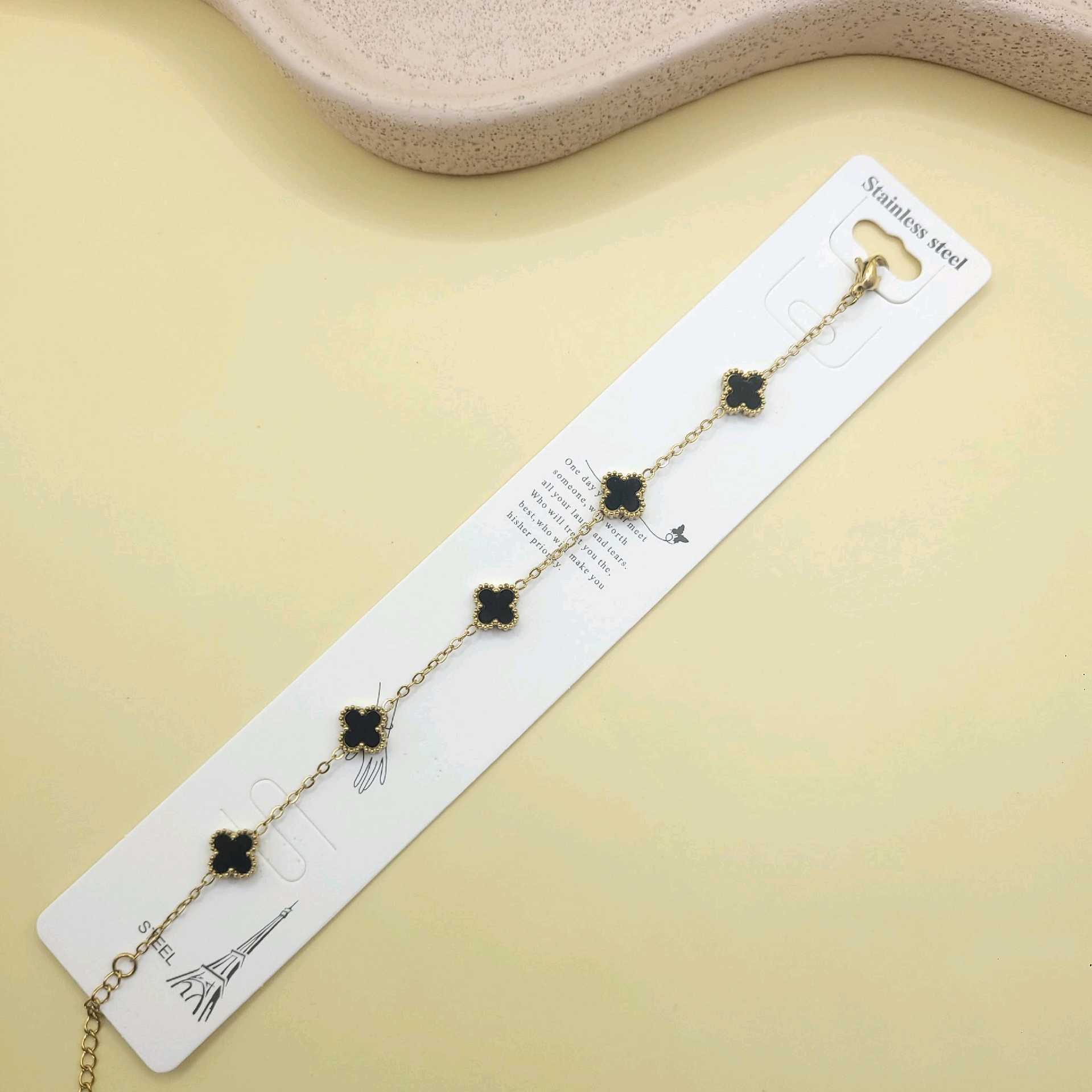 Pulsera Van cleef negra bordes dijes pequeños/ acero inoxidable 
