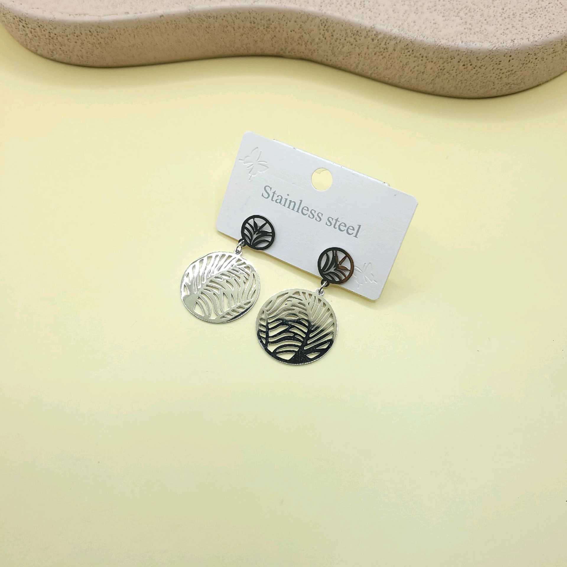 Aretes ramas tono plata / acero inoxidable