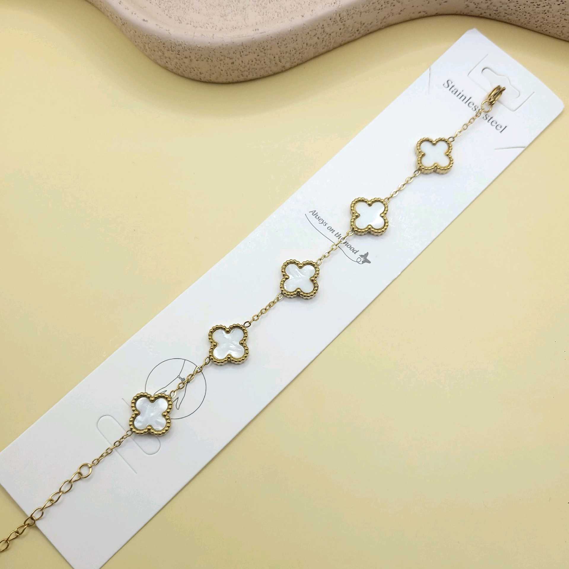 Pulsera Van Cleef blanca bordes / acero inoxidable 