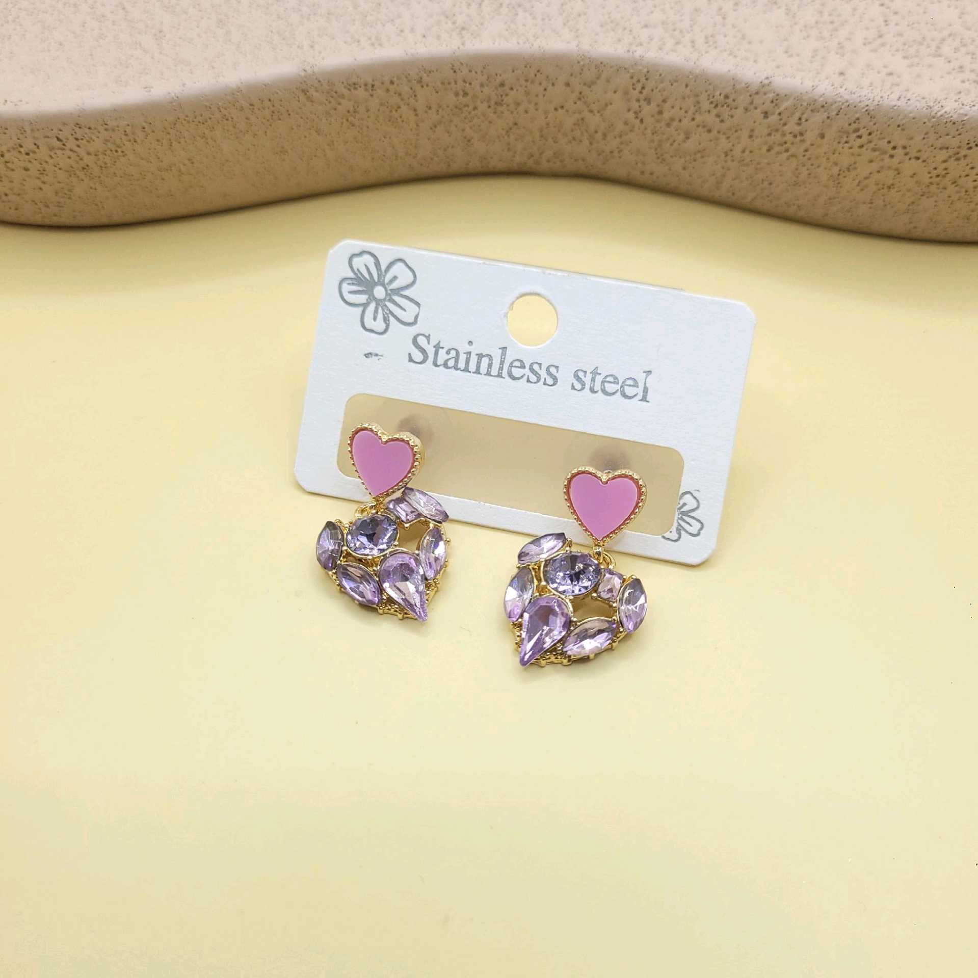 Aretes corazón rosa y piedras moradas / chapa