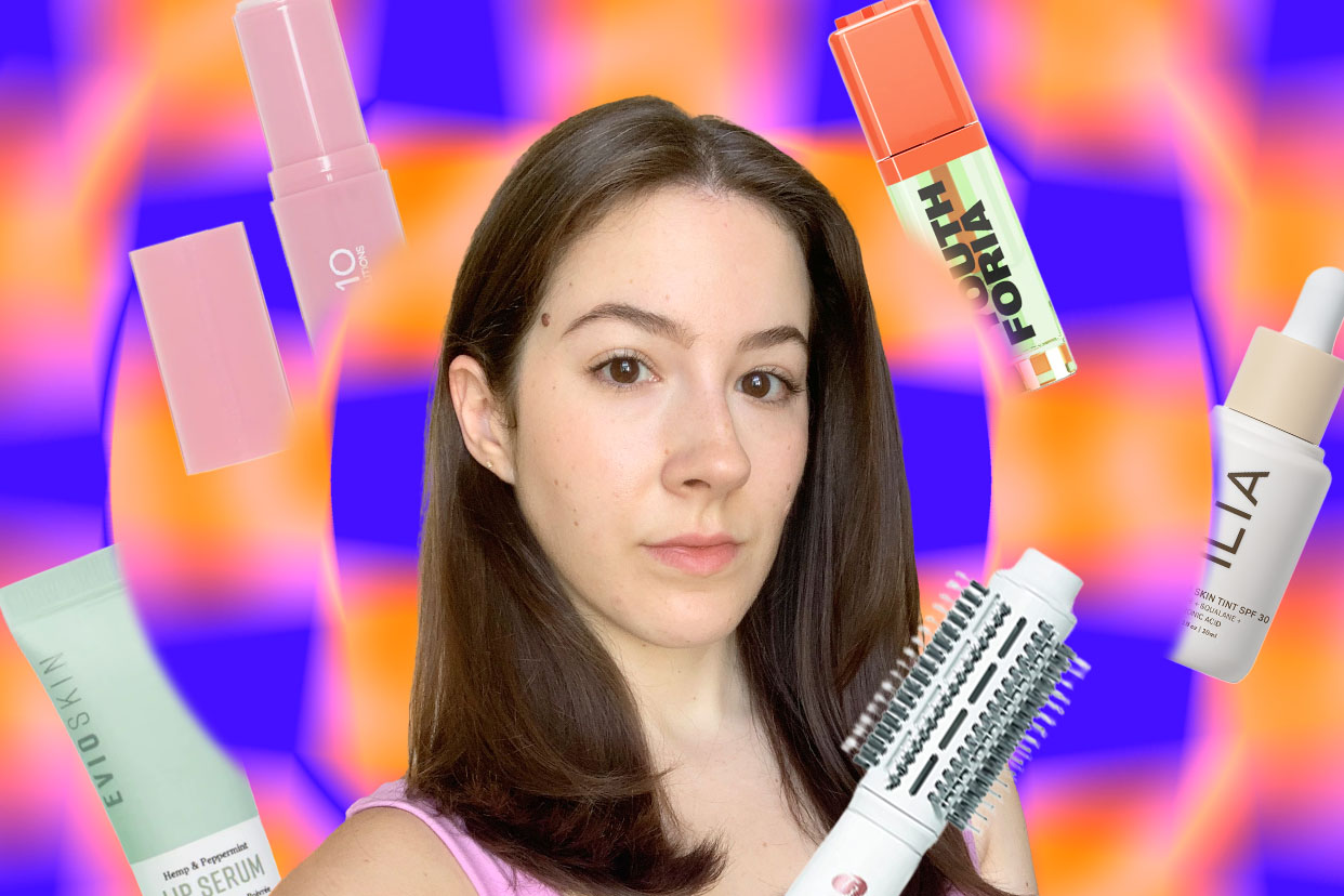abi surrounded by her favorite beaut products, purple checkered background