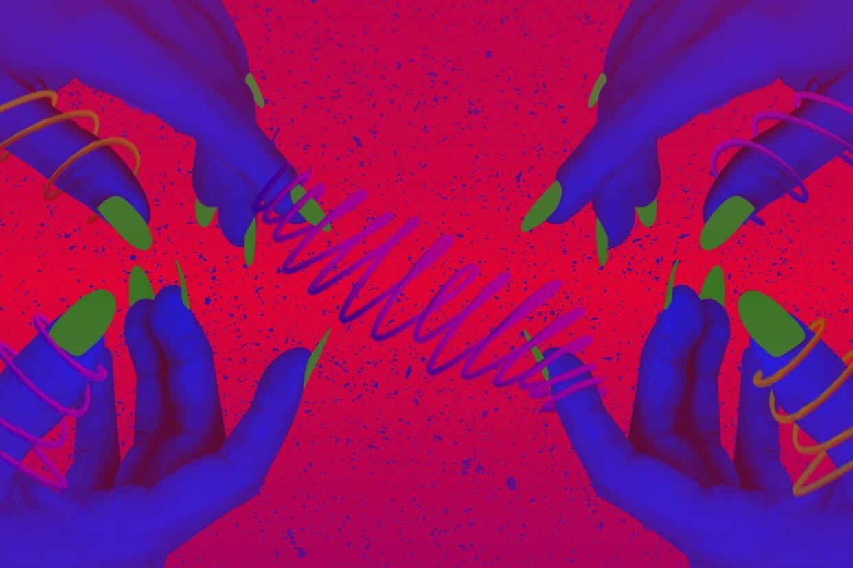 manicured nails on a colorful artful background