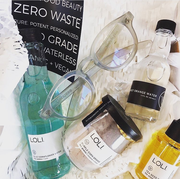 LOLI beauty products in a flat lay