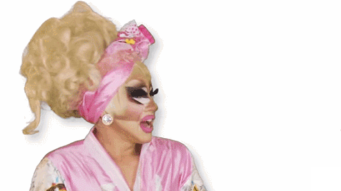 A drag queen shakes her head as she says, "Oh Honey."
