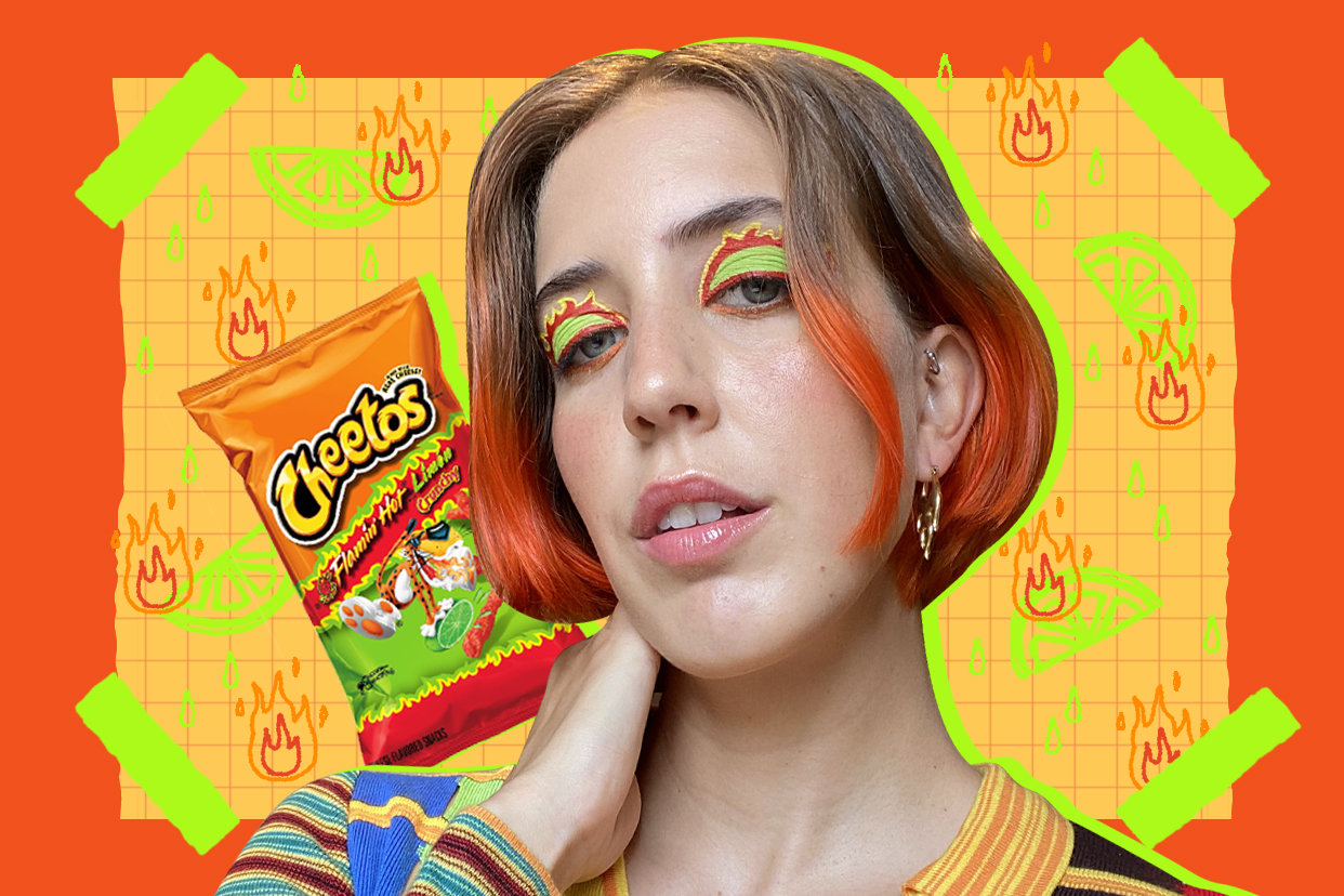 Woman with colorful hair and colorful Cheetoh's inspired makeup