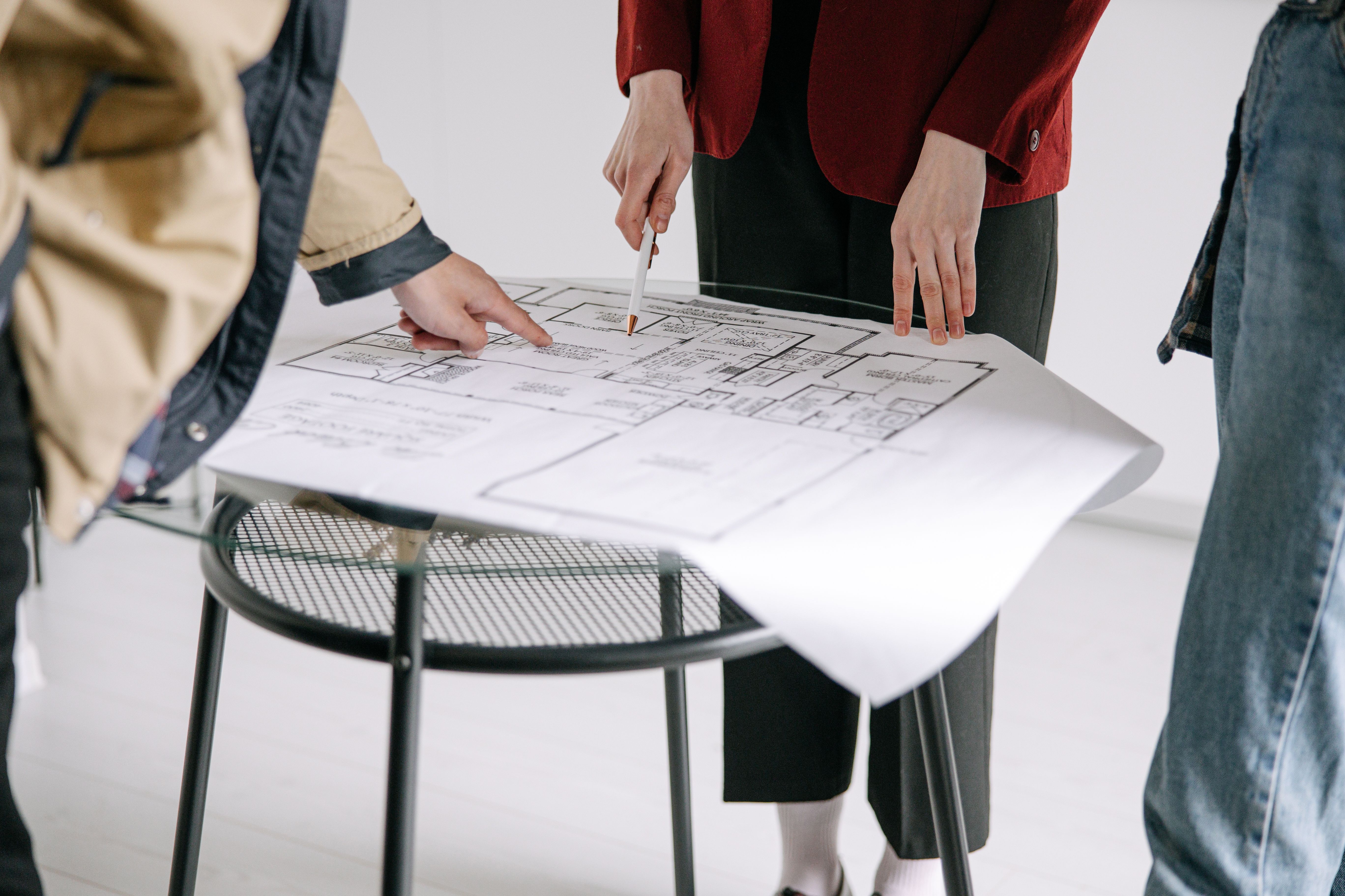 People reviewing blueprint