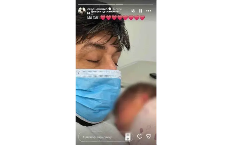 Ognjen sa ćerkicom u naručju