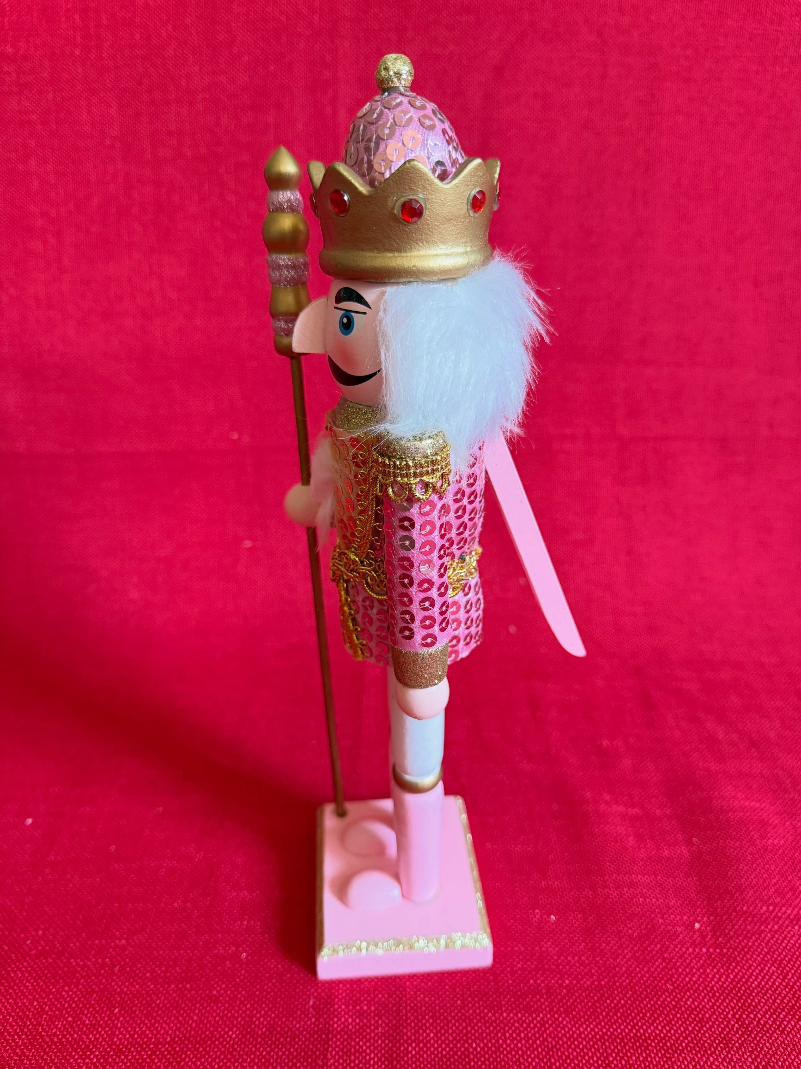 Adorno navideño de cascanueces dorado y rosado
