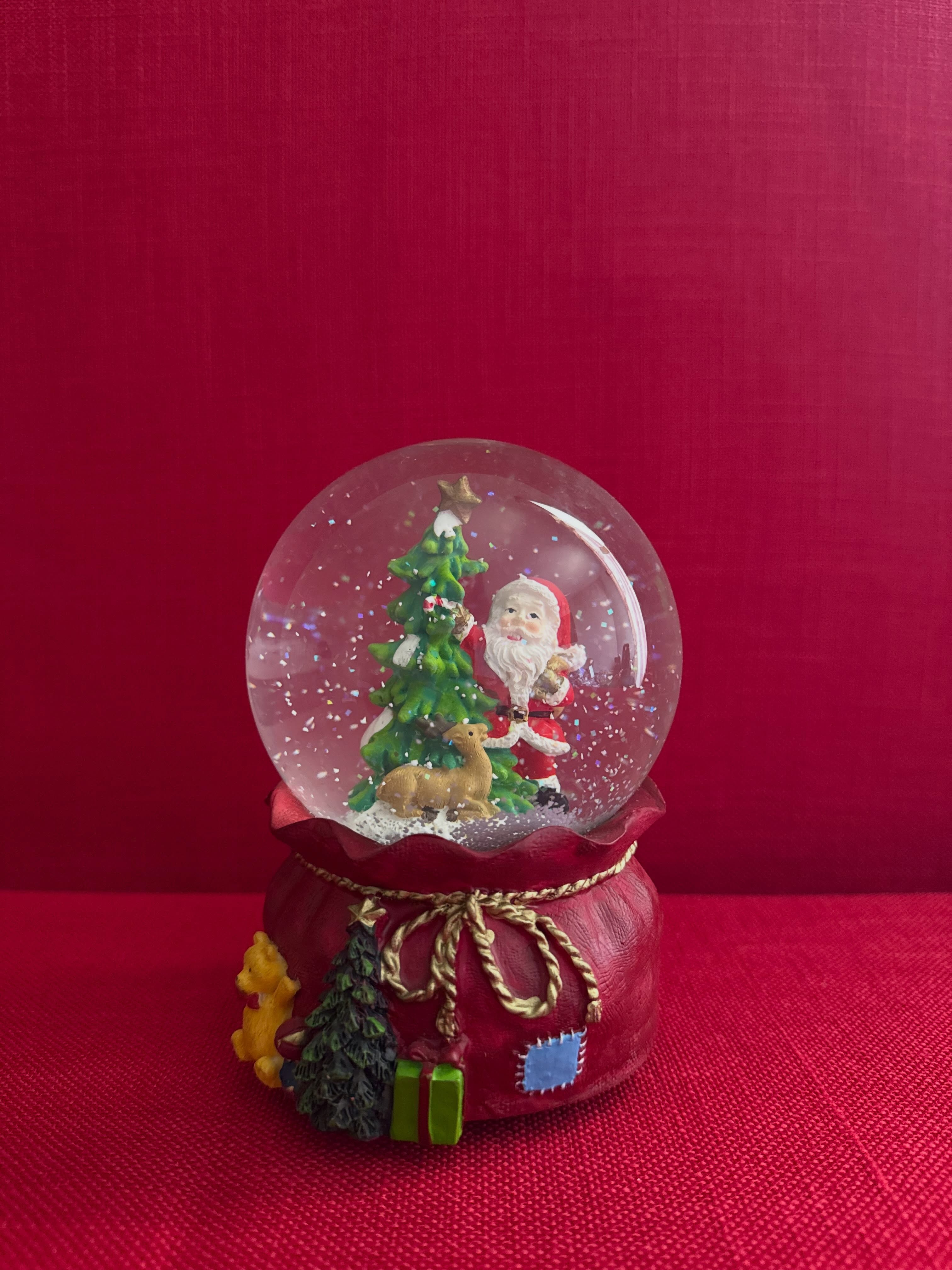 Decoración navideña con purpurina de Santa Clause con