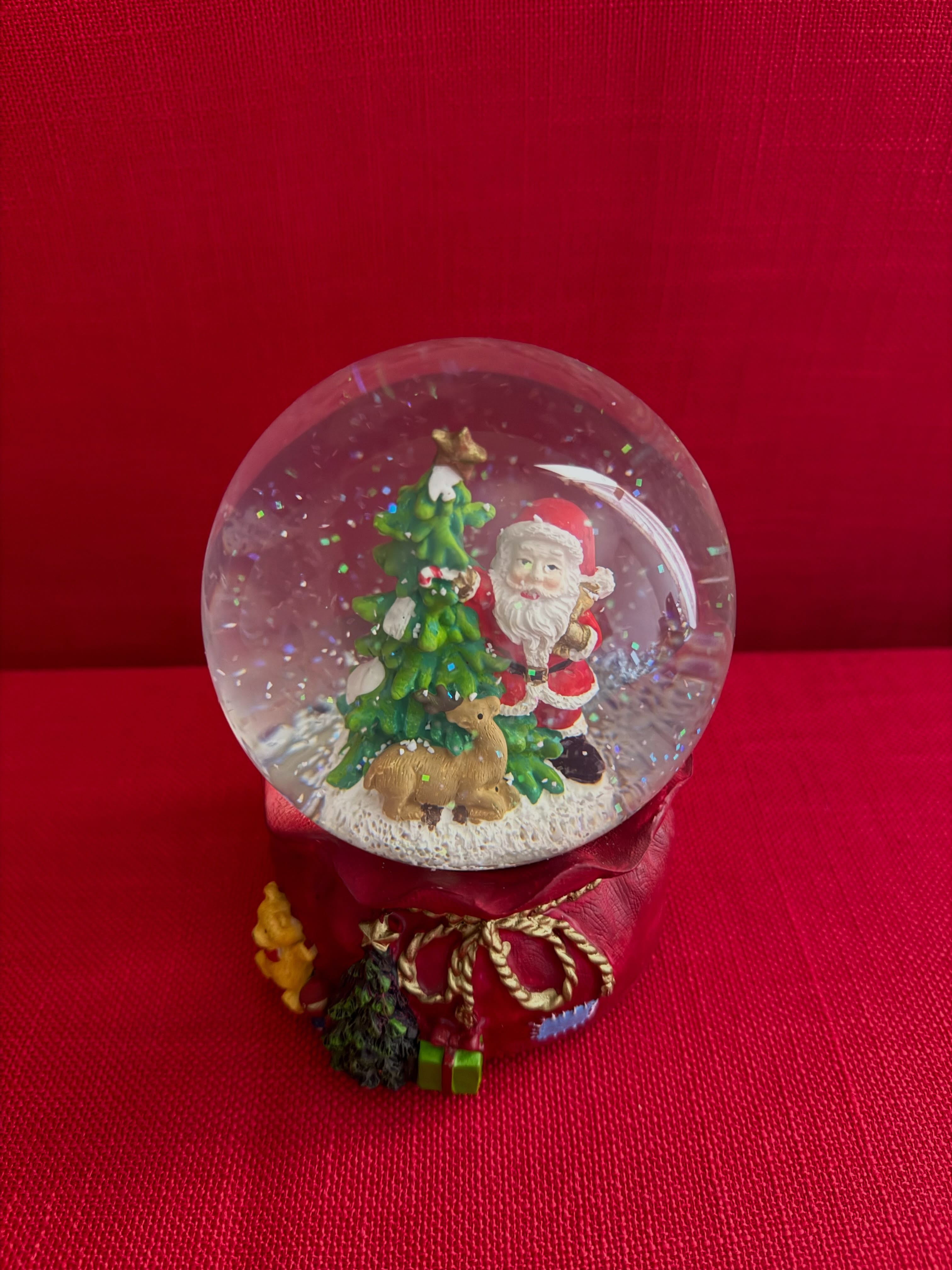 Decoración navideña con purpurina de Santa Clause con