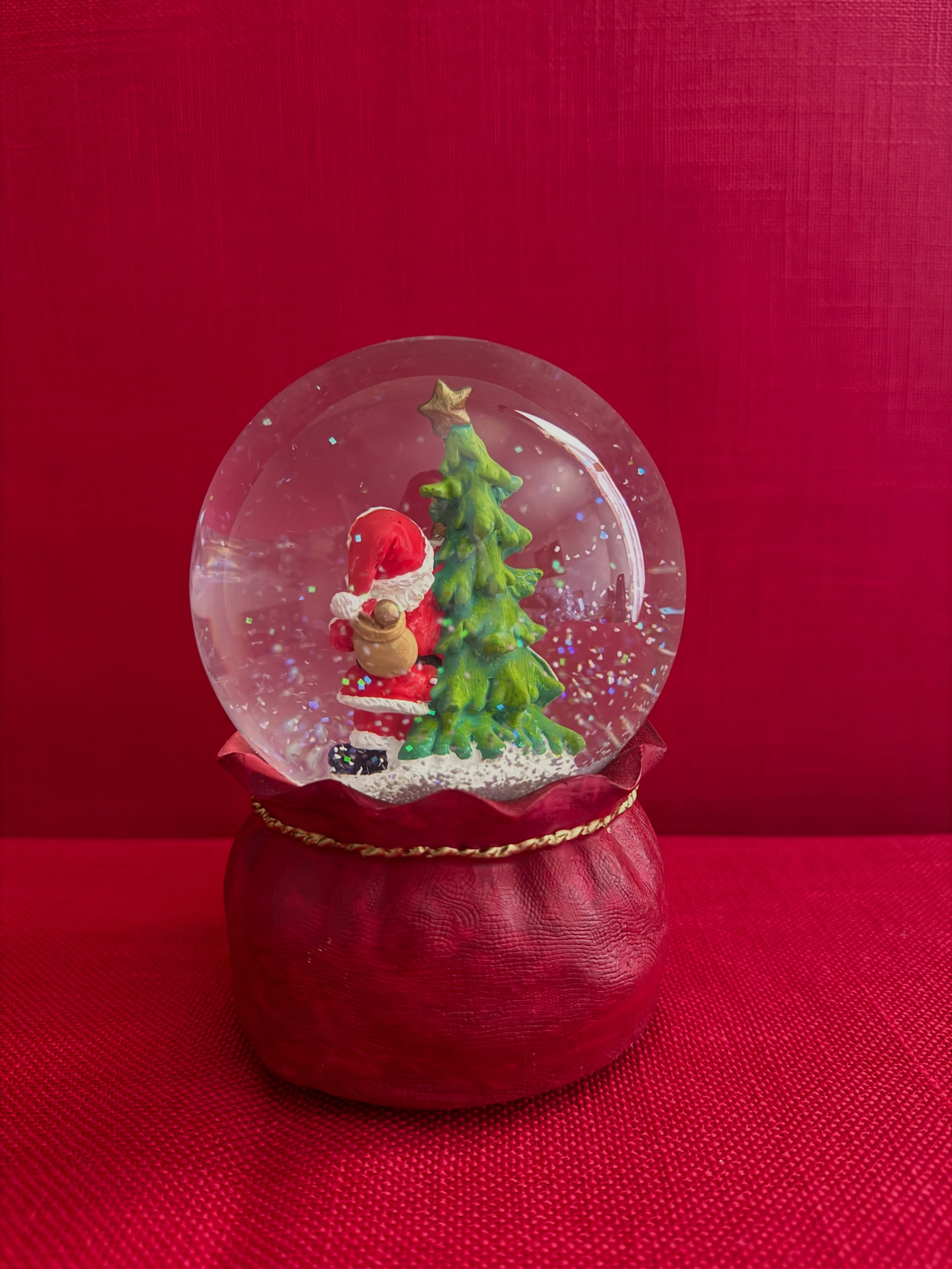 Decoración navideña con purpurina de Santa Clause con