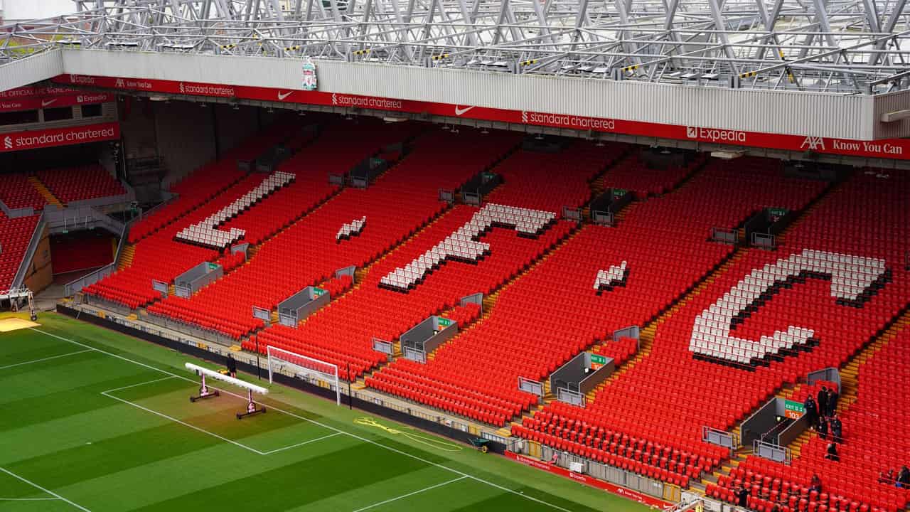 View of Anfield Stadium seating with prominent LFC letters. Perfect capture of iconic Liverpool FC venue.