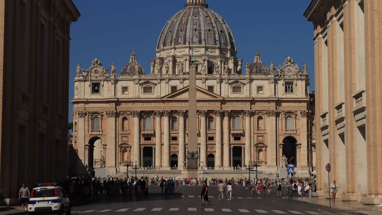 A stunning view of St Peter's Basilica in Vatican City, showcasing Renaissance architecture and spirituality.