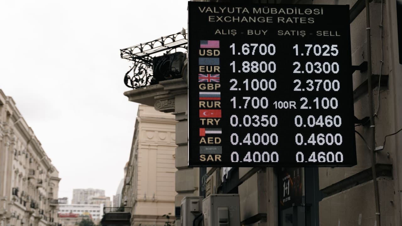 Currency exchange rates sign on a street in Baku, Azerbaijan.