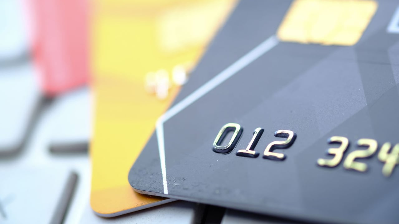 High-quality close-up of credit and debit cards, highlighting technology and security.