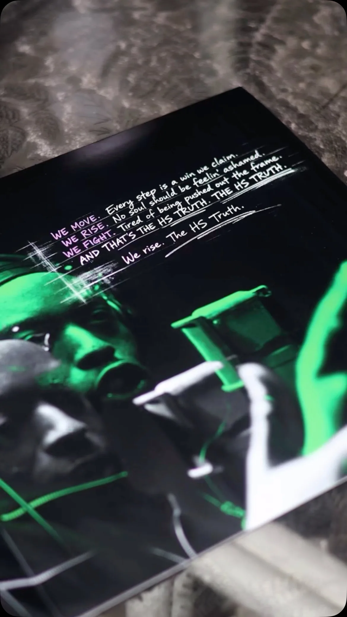 Green-lit performance frame with handwritten lyrics animated across the scene.