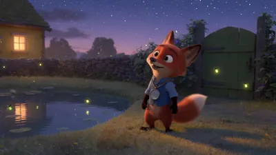 A fox in a blue vest stands in a dusk yard by a pond and a green gate.