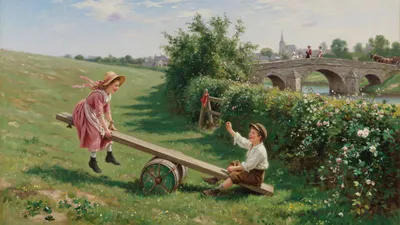 A boy in a cap and jacket is half hidden in a leafy country hedge beside a dirt road, peering out.