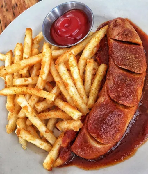 Currywurst with a sweet curry tomato sauce at Loreley Beer Garden