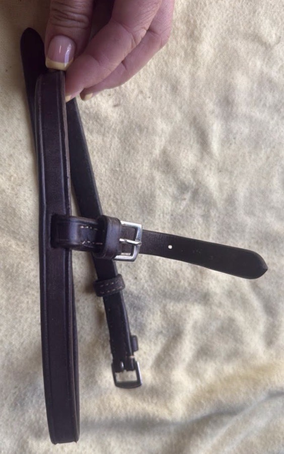 Brown buckle on flash attachment