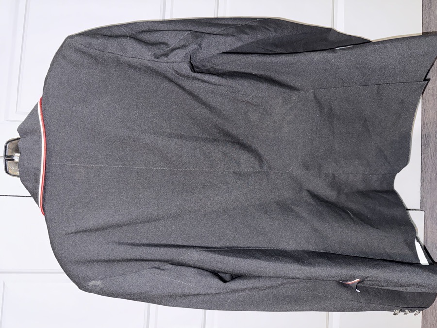 Winston Black Show Jacket with red and white lining on pockets and collar