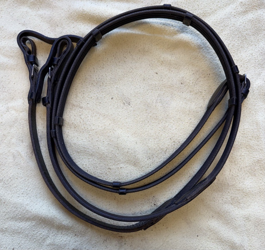 54” black webbed reins with handstops