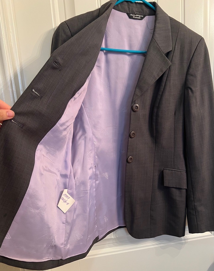 Beautiful Grand Prix hunt coat. Size 12R color grey with lavender lining