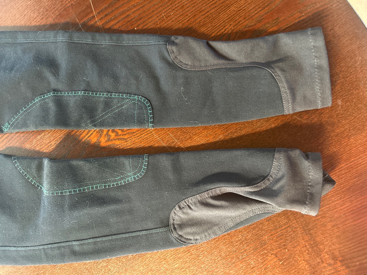  Navy piper reaches with emerald embroidery , around size 26 