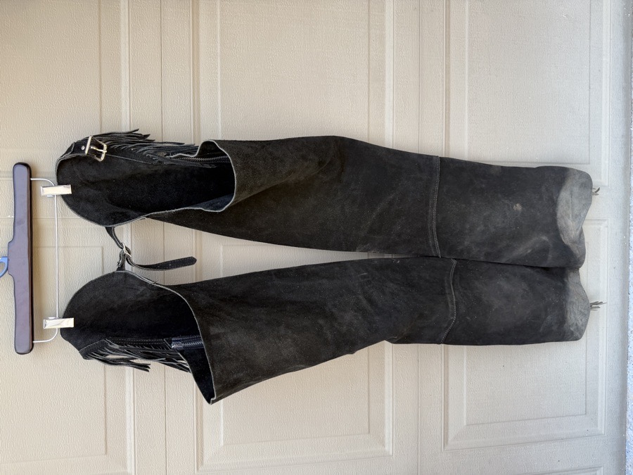 Black leather ladies show chaps
