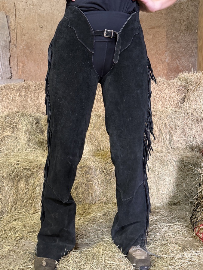 Black leather ladies show chaps