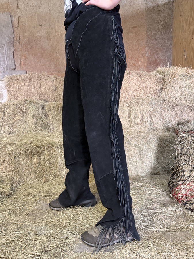 Black leather ladies show chaps