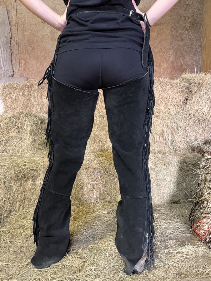 Black leather ladies show chaps