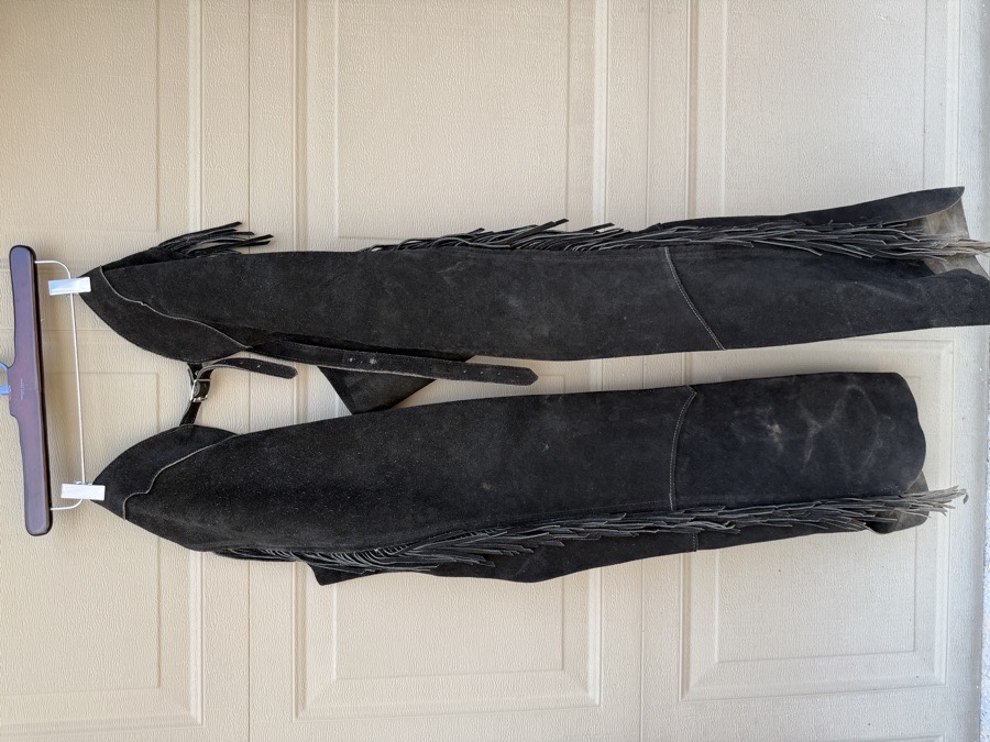 Black leather ladies show chaps