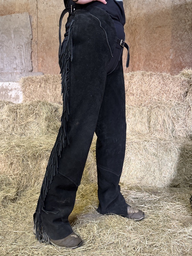 Black leather ladies show chaps