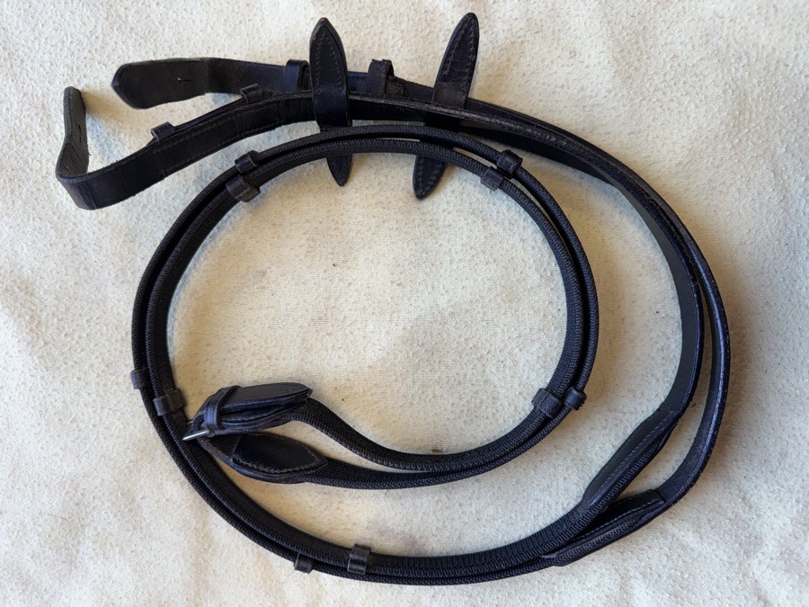 50” black rubberized webbed reins