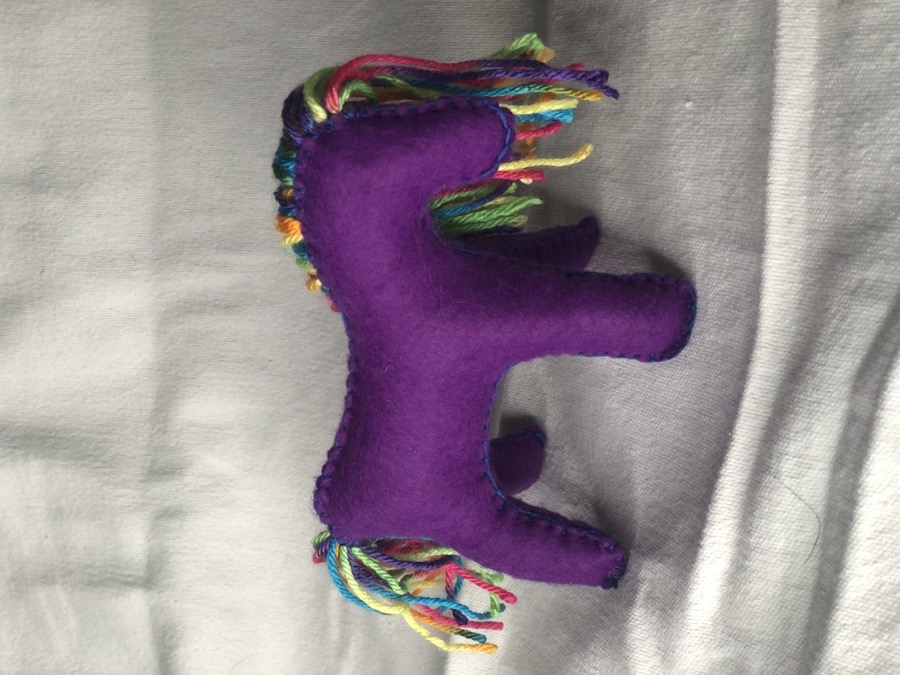 Hand sewn purple toy horse