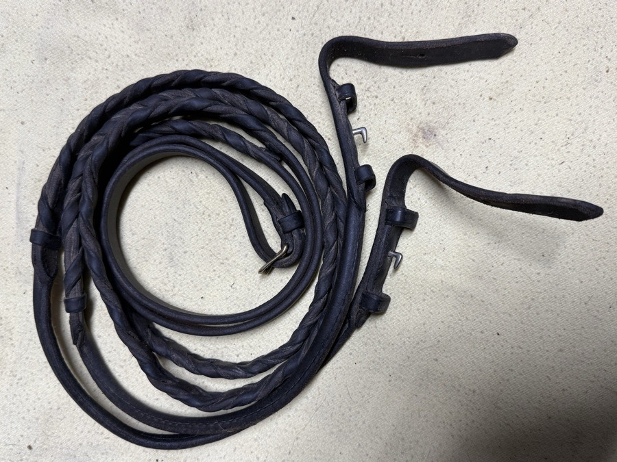 56” black rolled reins