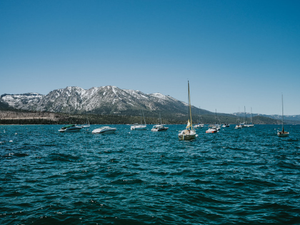 Lake Tahoe and mountains with boats.