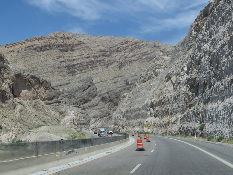 Driving north on I-15 through the Virgin River Gorge with road construction.
