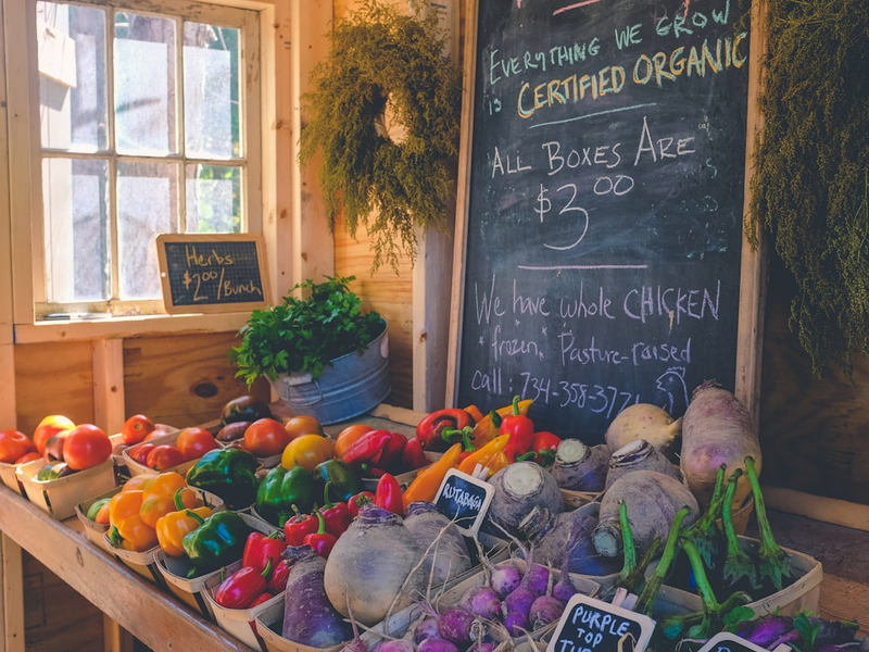 variety of vegetables display with Certified Organic signage