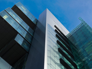 Modern architectural glass and metal building (Civil Justice Centre, Manchester). Photograph by Mark Stuckey.