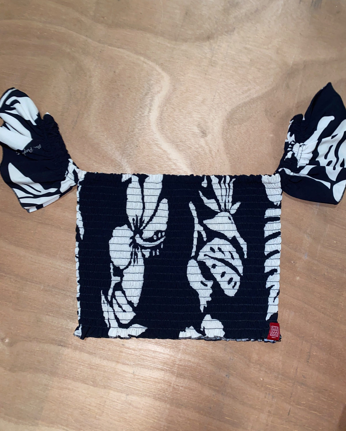 Top bandeau noir et blanc à motifs floraux photo 1