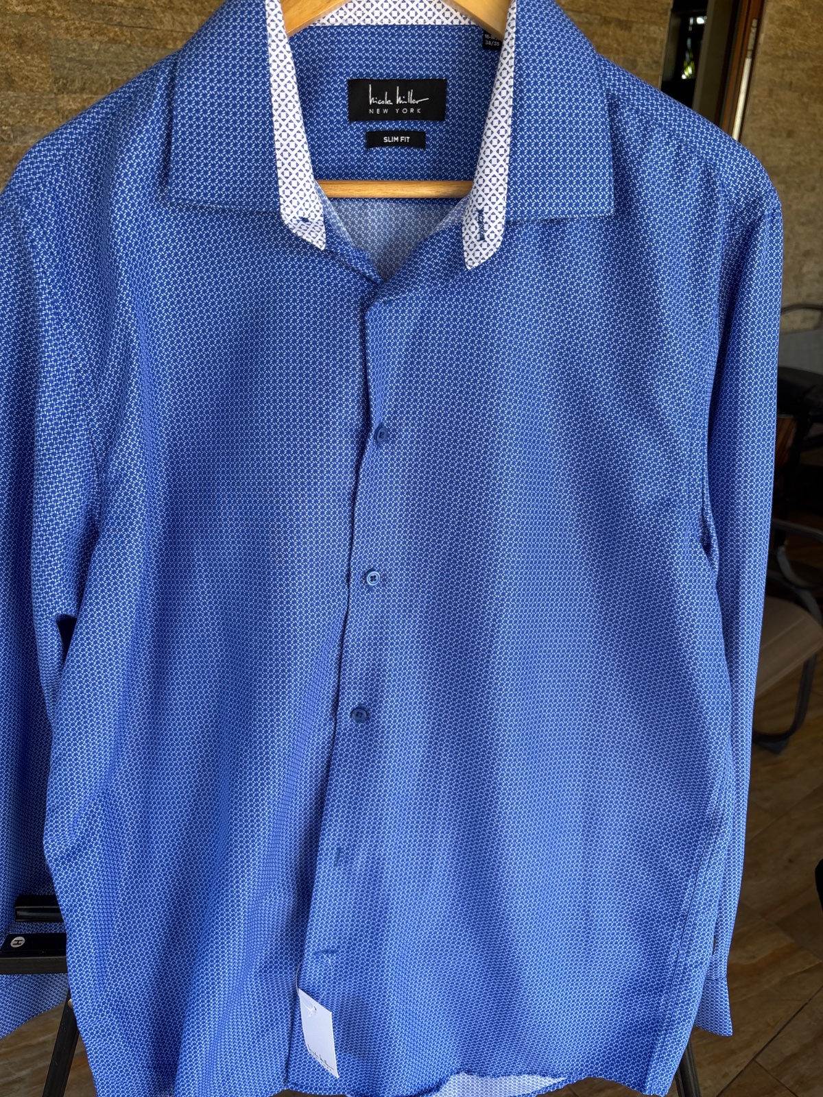 Chemise homme bleue à motifs discrets photo 1