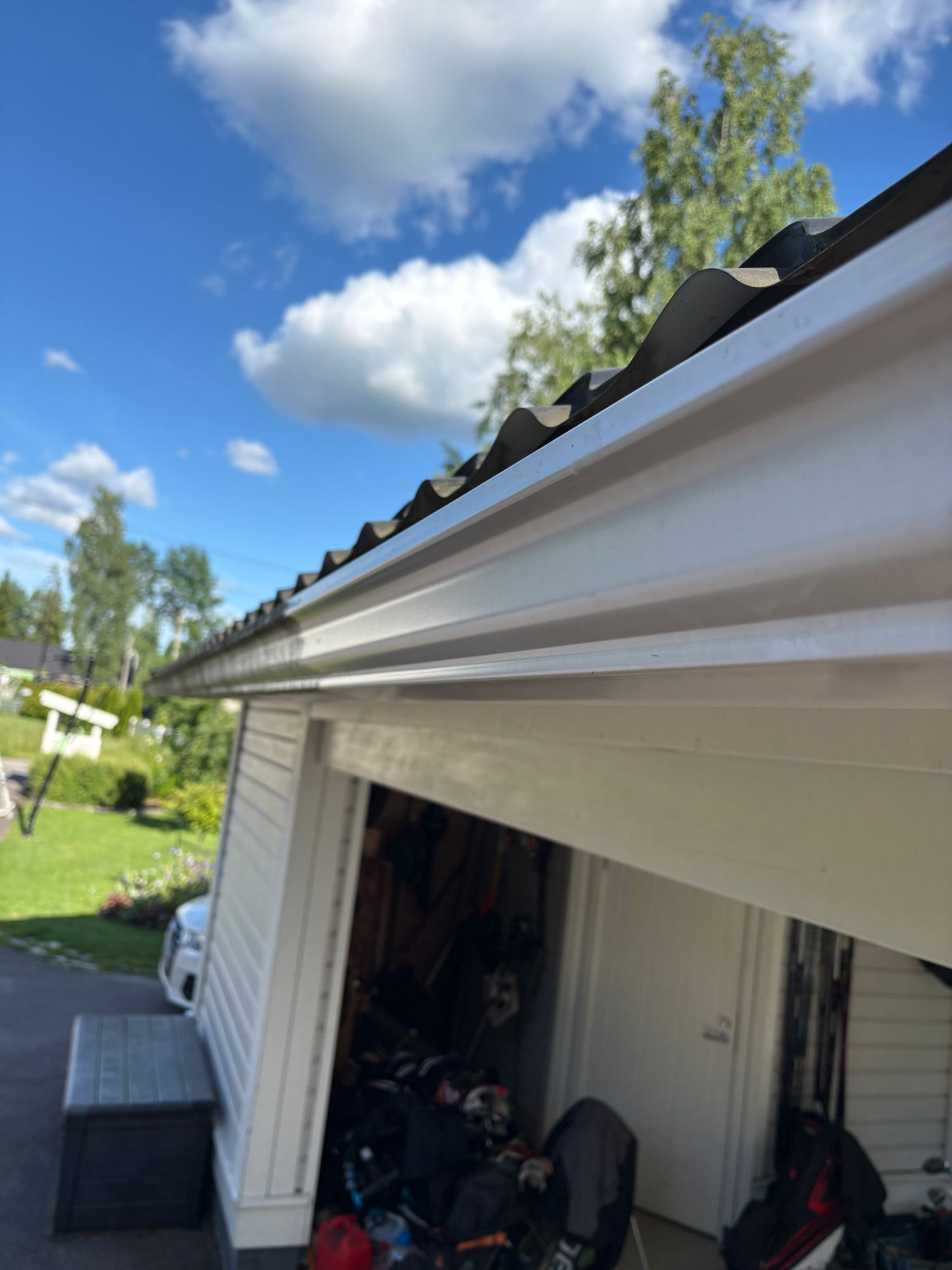 The same gutter after the wash — a bright white surface