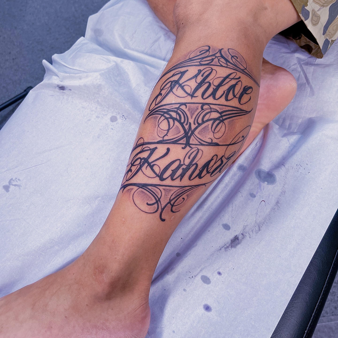 RYUBUN TATTOOERのレタリングのスクリプトのタトゥー